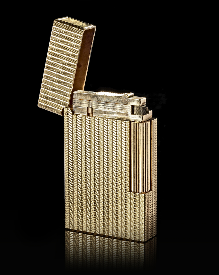 A FRENCH GOLDPLATED ST. DUPONT LIGHTER