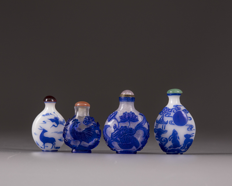 Four peking-glass snuff-bottles