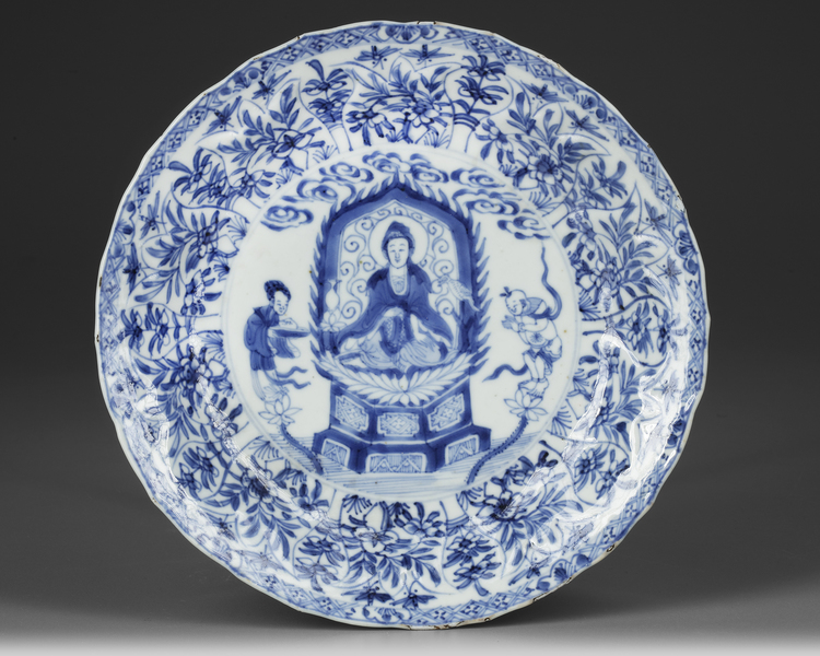 A CHINESE BLUE AND WHITE 'BUDDHIST' DISH, KANGXI PERIOD (1662-1722)