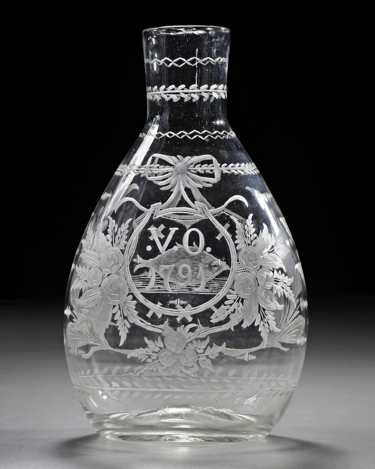 A POSSIBLY DUTCH ELABORATELY ENGRAVED WHITE GLASS CARAFE,20TH CENTURY