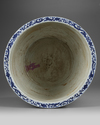 A CHINESE BLUE AND WHITE JARDENIER, MING DYNASTY OR LATER