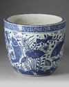 A CHINESE BLUE AND WHITE JARDENIER, MING DYNASTY OR LATER