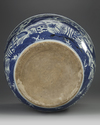 A CHINESE BLUE AND WHITE JARDENIER, MING DYNASTY OR LATER