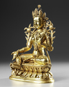 A GILT-BRONZE FIGURE OF GREEN TARA QING DYNASTY, 18TH CENTURY