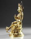 A GILT-BRONZE FIGURE OF GREEN TARA QING DYNASTY, 18TH CENTURY