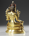 A GILT-BRONZE FIGURE OF GREEN TARA QING DYNASTY, 18TH CENTURY