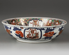 A JAPANESE IMARI ‘BLACK SHIP’ BOWL, MEIJI PERIOD (1868-1912)