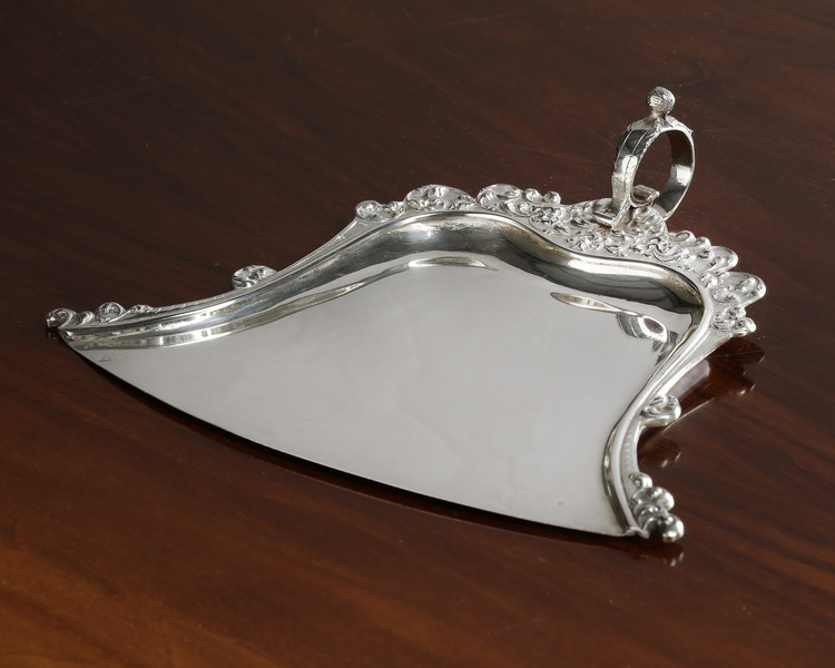 A DUTCH SILVER DUST PAN, 1925
