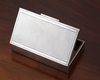 A RECTANGULAR SILVER BOX, 20TH CENTURY