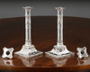 A PAIR OF DUTCH SILVER NEOCLASSICAL CANDLESTICKS, 1908 & 1911