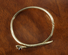 A 14 CARAT GOLD EUROPEAN 'SNAKE' BRACELET