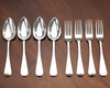 FOUR DUTCH SILVER DINNER FORKS AND FOUR SILVER DINNER SPOONS, (8 PIECES), (1886/1887)
