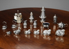 A COLLECTION OF SILVER PLATED SALTS, CASTERS AND OTHER OBJECTS