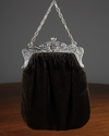 AN ART NOUVEAU SILVER PURSE BRACKET WITH BLACK VELVET TEXTILE PURSE, CIRCA 1920