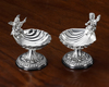 A PAIR OF SILVER SALTS SHAPED AS ANGELS MAKING MUSIC SEATED ON A SHELL (2)