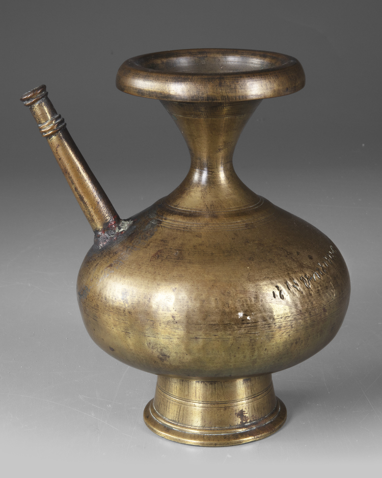 AN INDIAN GILT BRONZE WATER POT (LOTA), NORTH INDIA 18TH CENTURY