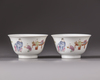 A pair of small 'famille rose' bowls