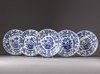 Five blue and white moulded plates