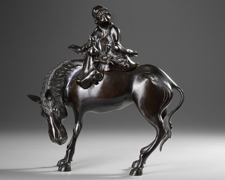 A JAPANESE BRONZE IMMORTAL FIGURE ON A HORSE, MID 19TH CENTURY