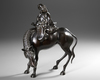 A JAPANESE BRONZE IMMORTAL FIGURE ON A HORSE, MID 19TH CENTURY