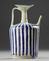A KASHAN BLUE AND WHITE POTTERY EWER, PERSIA, 11TH-12TH CENTURY