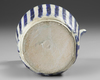 A KASHAN BLUE AND WHITE POTTERY EWER, PERSIA, 11TH-12TH CENTURY