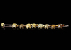 A CHINESE JADE CARVED TURTLES BRACELET, 20TH CENTURY