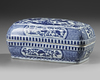 A CHINESE BLUE AND WHITE RECTANGULAR DRAGON BOX AND COVER, QING DYNASTY (1644–1911)