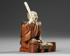 A JAPANESE WOOD AND BONE CARVED OKIMONO, MEIJI PERIOD (1868-1912)