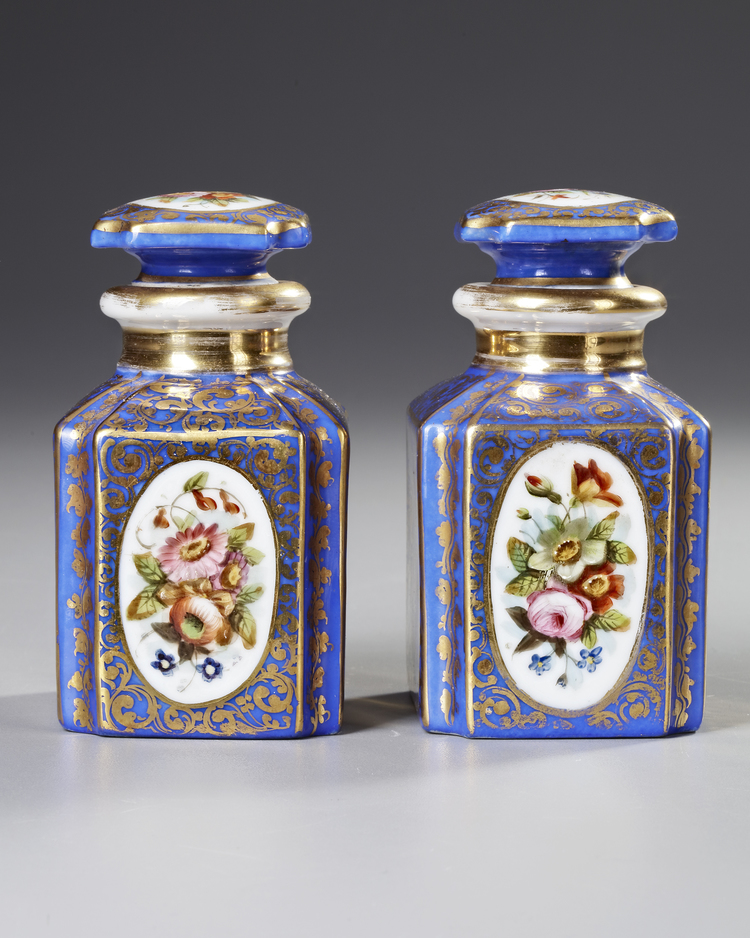 A PAIR OF ANTIQUE HAND-PAINTED PORCELAIN TEA CADDIES