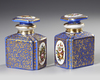 A PAIR OF ANTIQUE HAND-PAINTED PORCELAIN TEA CADDIES