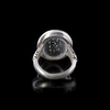A PERSIAN CRYSTAL ROCK CARVED SILVER RING, 19TH CENTURY