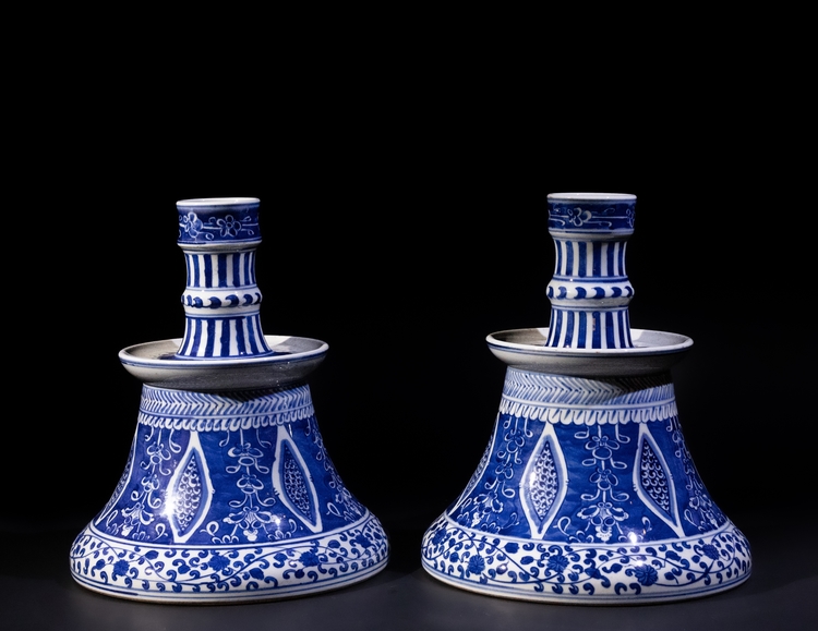 A PAIR OF CHINESE BLUE AND WHITE PORCELAIN CANDLESTICKS