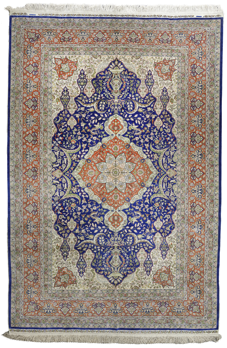 A HIGHLY IMPORTANT AND RARE SIGNED HEREKE SILK CARPET