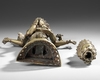 A SINO-TIBETAN GILT BRONZE AVALOKITESHVARA WITH MULTIPLE HEADS AND ARMS