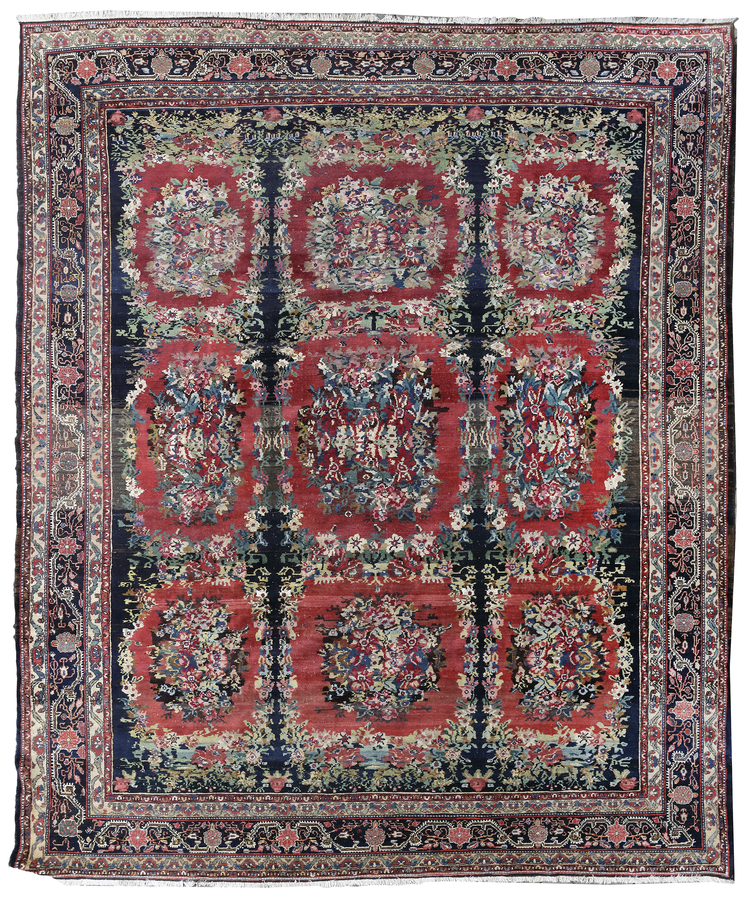 AN ANTIQUE SQUARE KARABAG CARPET