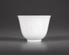 A SMALL CHINESE WHITE-GLAZED DRAGON AND PHOENIX CUP, 20TH CENTURY