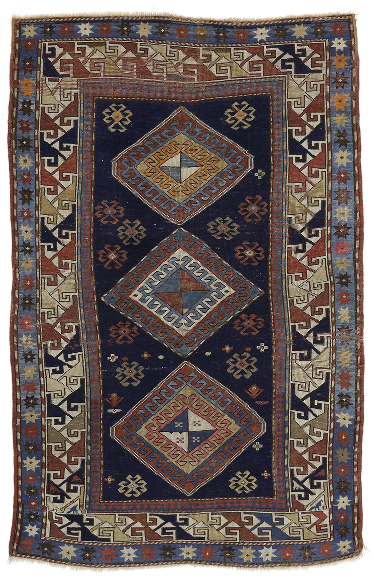 AN ANTIQUE SHIRVAN RUG, 19TH CENTURY