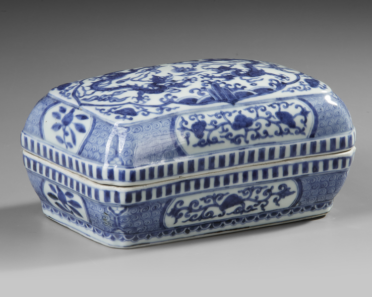 A CHINESE BLUE AND WHITE RECTANGULAR DRAGON BOX AND COVER, QING DYNASTY (1644–1911)