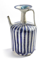 A KASHAN BLUE AND WHITE POTTERY EWER, PERSIA, 11TH-12TH CENTURY