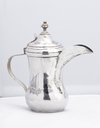 A PAIR OF IRAQI SILVER NIELLO PIECES DEPICTING THE MARSHES OF SOUTHERN IRAQ
