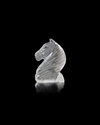 AN ISLAMIC CARVED ROCK CRYSTAL CHESS PIECE, 10TH-12TH CENTURY