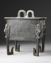 A JAPANESE BRONZE CENSER WITH DRAGONS AND CALLIGRAPHY, 19TH- EARLY 20TH CENTURY