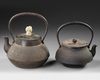 A PAIR OF JAPANESE TETSUBIN CAST IRON TEA KETTLES, 20TH CENTURY