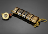 A JAPANESE BLACK AND GOLD FOUR-CASE INRO WITH PINE LANDSCAPE,EDO PERIOD (1615–1868)