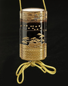 A JAPANESE BLACK AND GOLD FOUR-CASE INRO WITH PINE LANDSCAPE,EDO PERIOD (1615–1868)