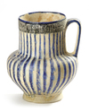 A KASHAN POTTERY JUG, PERSIA,  11TH-12TH CENTURY