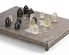 AN EXTREMELY RARE CHESS BOARD MADE OF SOLID SILVER AND DATING TO THE FATIMID PERIOD 909-1170 AD AND INSCRIBED WITH A POEM BY ‘UMARA AL-YAMANI’
