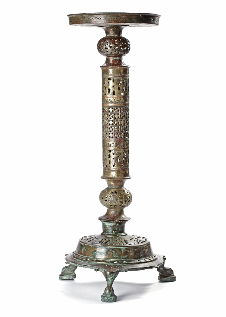 A MONUMENTAL KHURASSAN BRONZE LAMP-STAND,  PERSIA, 12TH CENTURY