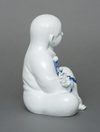 KAKIEMON’WARE PORCELAIN FIGURE OF A CHILD, SHOWA PERIOD (1926-1989)